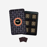 Maxim's de Paris Black pencil box - 12 dark chocolate squares